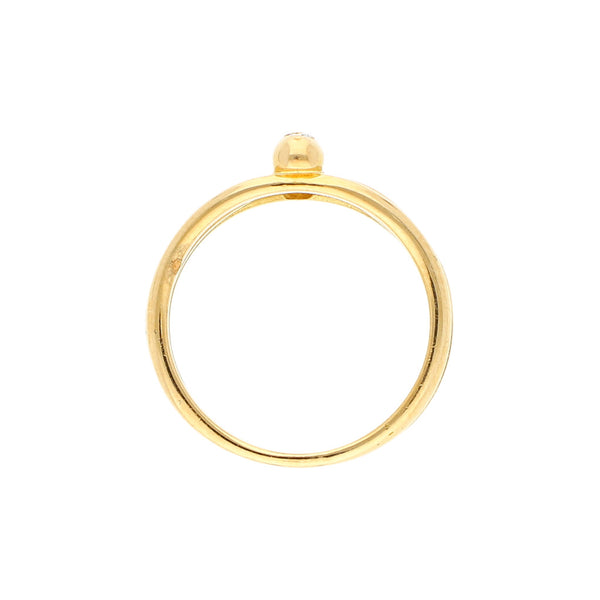 Anillo diseño especial con diamantes en oro amarillo 18 kilates.