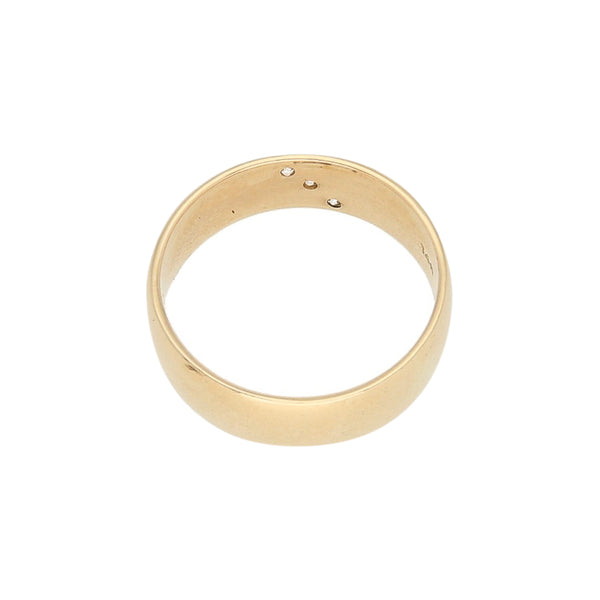 Argolla lisa con diamantes en oro amarillo 14 kilates.