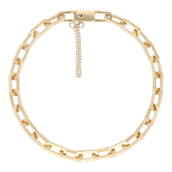 Pulsera eslabón cruzado en oro amarillo 14 kilates.