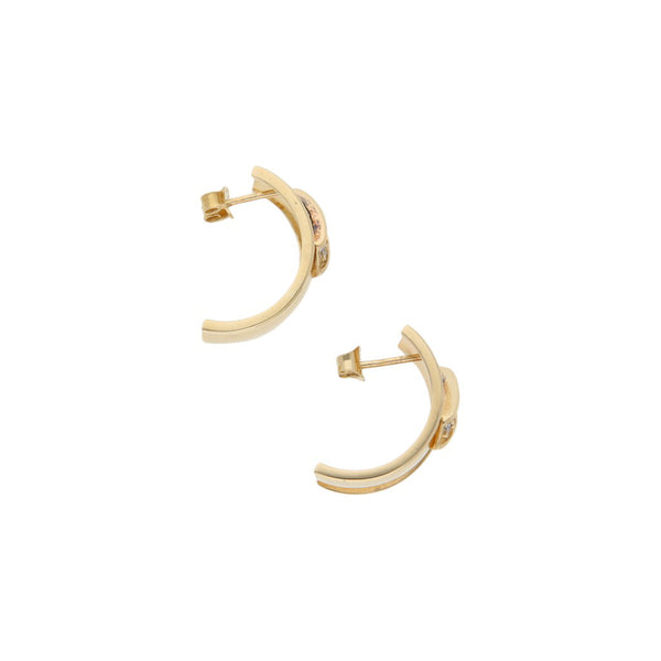 Broqueles diseño especial con circonias en oro amarillo 14 kilates.