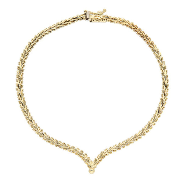 Pulsera eslabón boleado en oro amarillo 14 kilates.