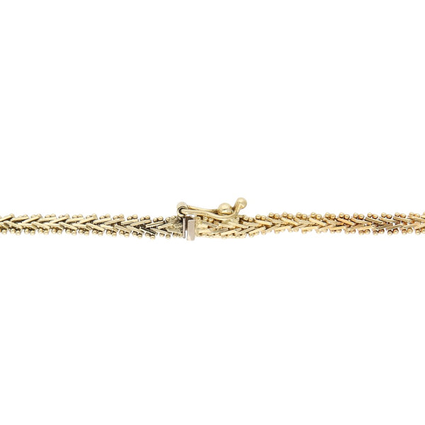 Pulsera eslabón boleado en oro amarillo 14 kilates.