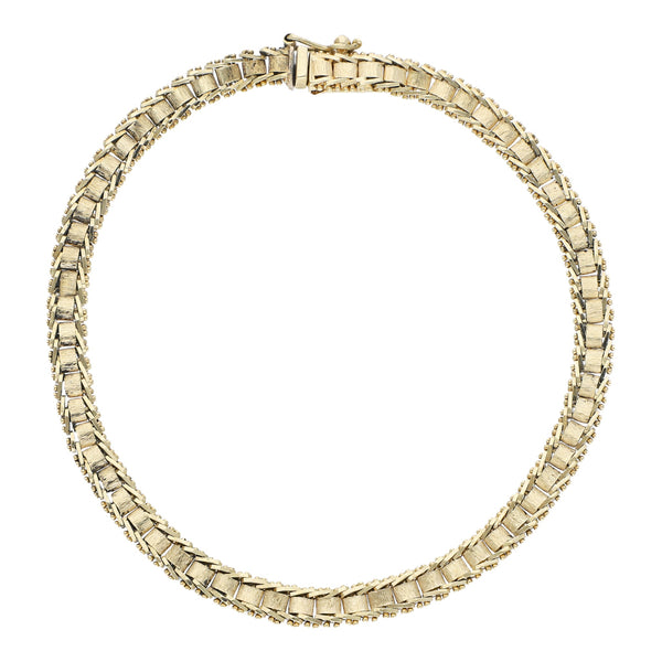Pulsera eslabón boleado en oro amarillo 14 kilates.