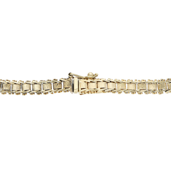 Pulsera eslabón boleado en oro amarillo 14 kilates.