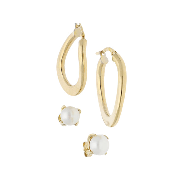 Arracadas y broqueles diseño especial con perla en oro amarillo 14 kilates.