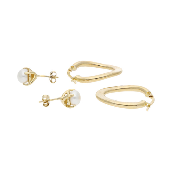 Arracadas y broqueles diseño especial con perla en oro amarillo 14 kilates.