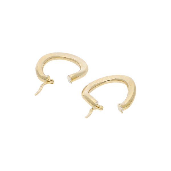 Arracadas y broqueles diseño especial con perla en oro amarillo 14 kilates.