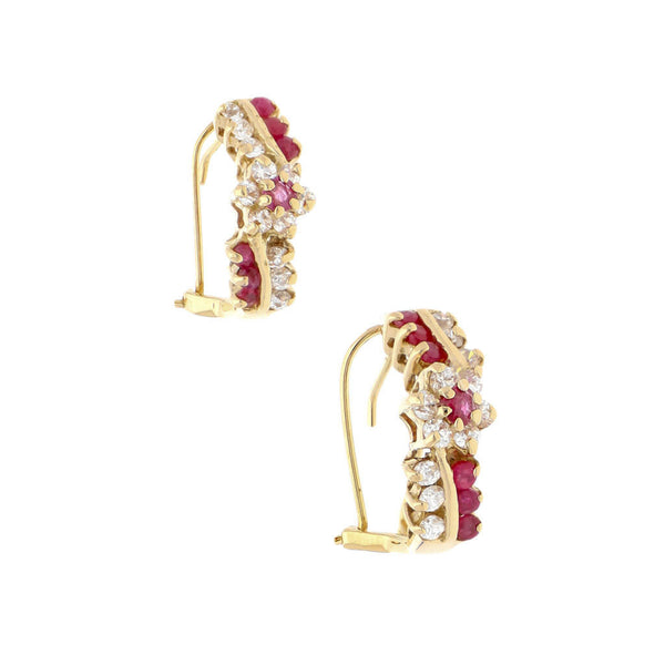 Aretes diseño especial con rubíes y sintéticos en oro rosa 12 kilates.