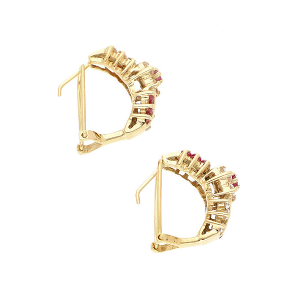 Aretes diseño especial con rubíes y sintéticos en oro rosa 12 kilates.