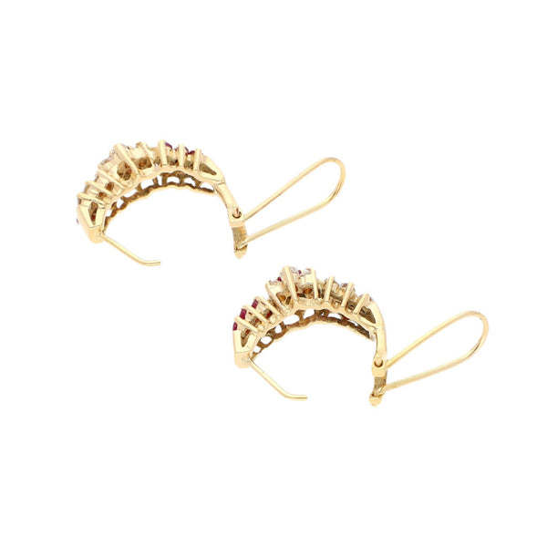Aretes diseño especial con rubíes y sintéticos en oro rosa 12 kilates.