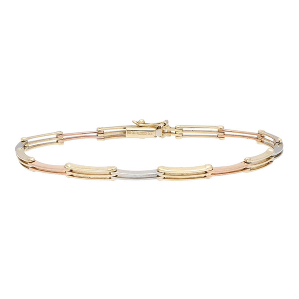 Pulsera eslabón articulado en oro tres tonos 14 kilates.