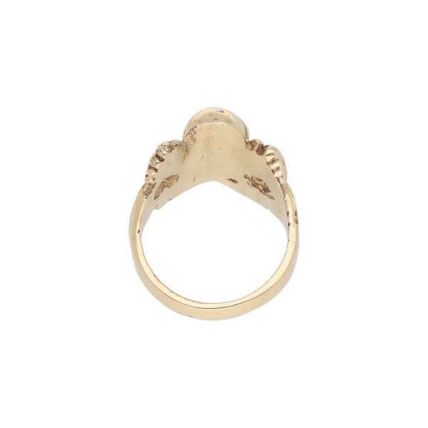 Anillo diseño especial con circonias motivo esqueleto en oro amarillo 14 kilates.