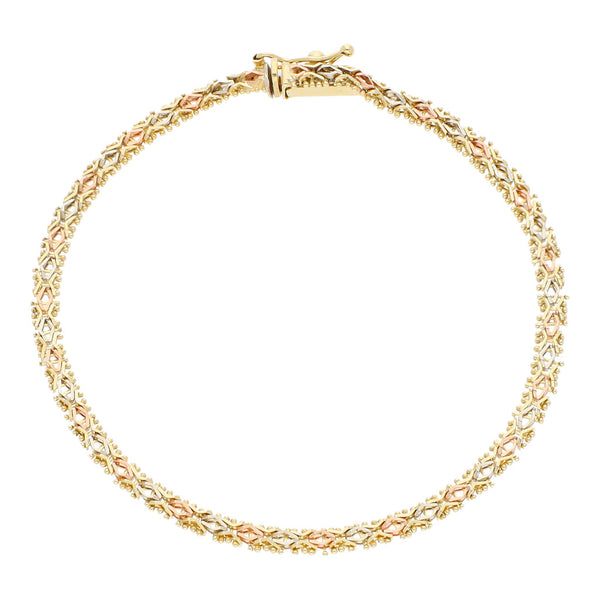 Pulsera eslabón boleado en oro tres tonos 14 kilates.