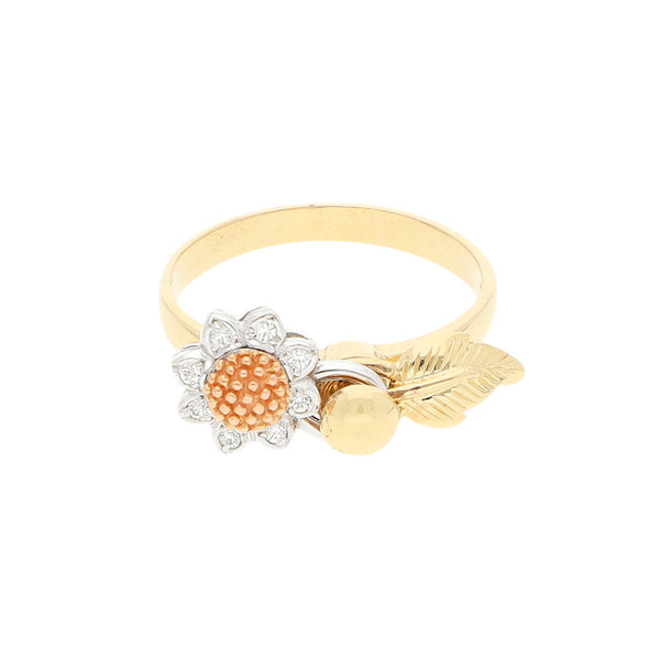 Anillo giratorio motivo girasol con circonias en oro dos tonos 14 kilates.