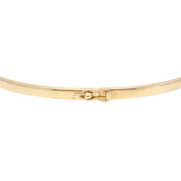 Pulsera de arillo lisa en oro amarillo 14 kilates.