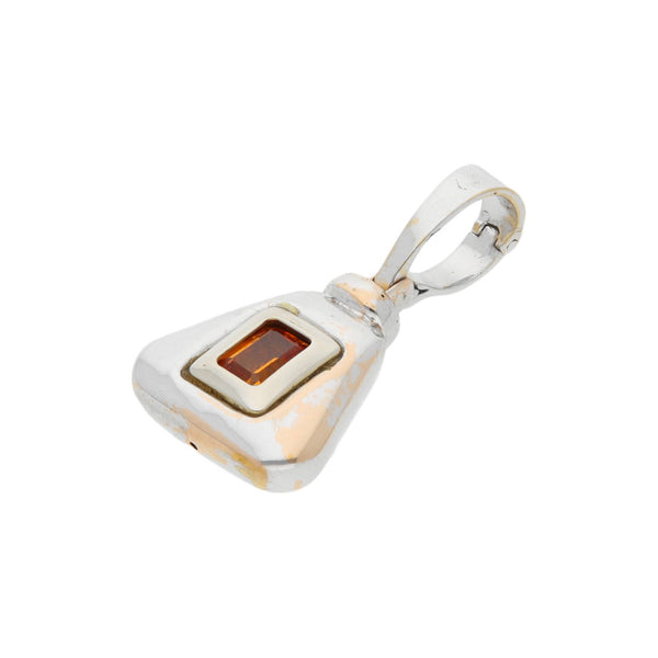 Dije diseño especial con ambar en oro blanco 18 kilates.
