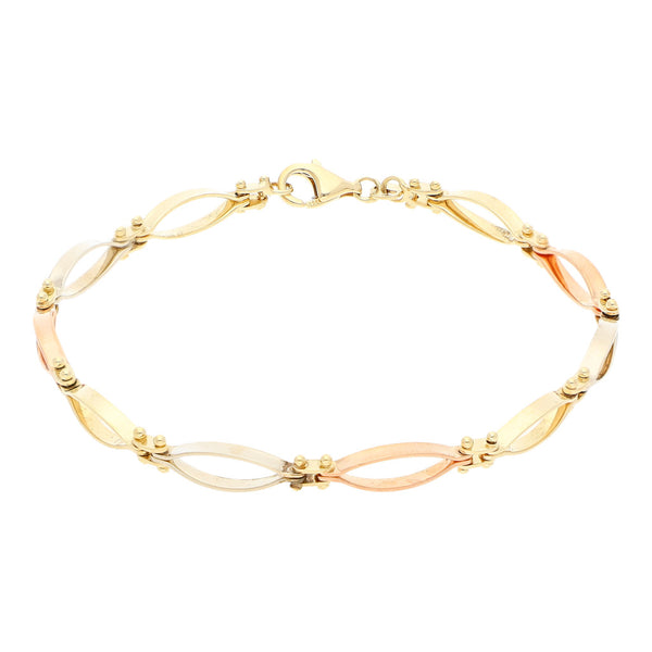 Pulsera eslabón articulado en oro tres tonos 14 kilates.