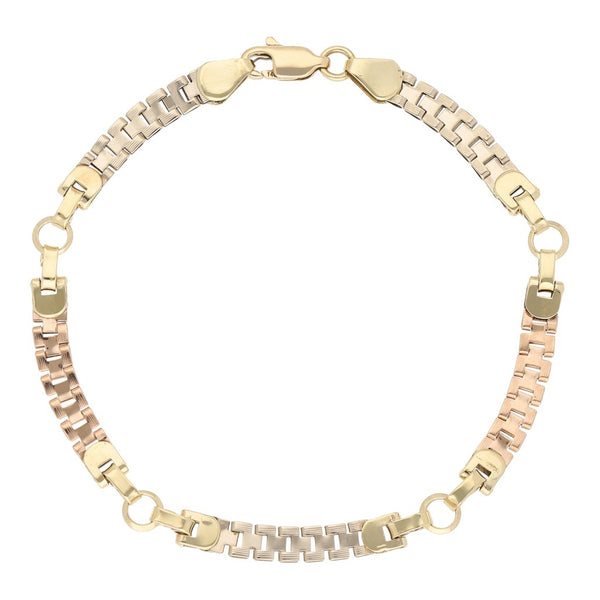 Pulsera eslabón articulado en oro tres tonos 14 kilates.