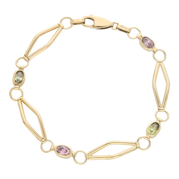 Pulsera eslabón articulado con sintéticos en oro amarillo 14 kilates.