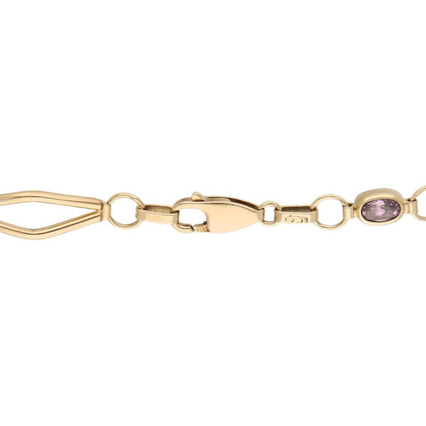 Pulsera eslabón articulado con sintéticos en oro amarillo 14 kilates.