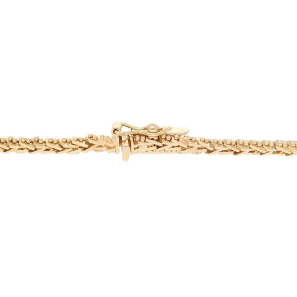 Pulsera eslabón boleado en oro tres tonos 14 kilates.