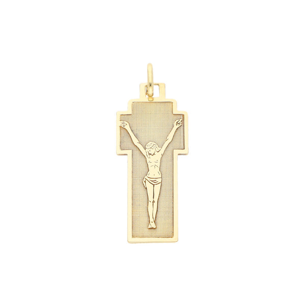 Medalla estilizada motivo Cristo en oro amarillo 14 kilates.