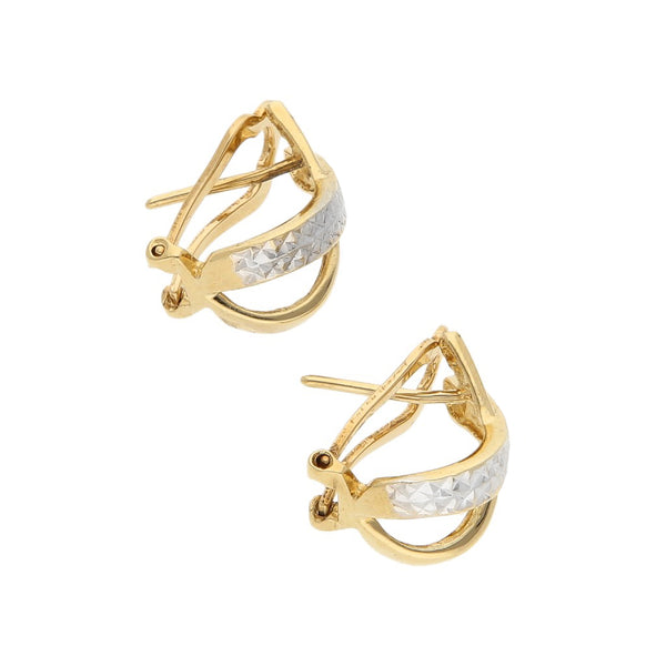 Aretes diseño especial en oro amarillo 14 kilates.