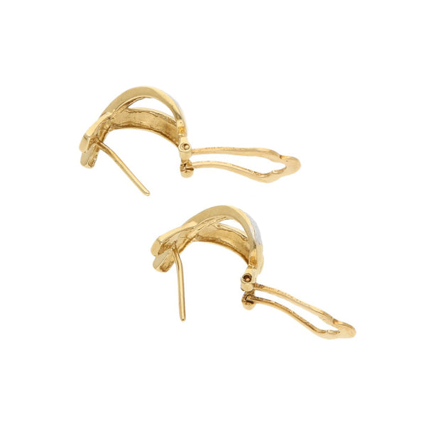 Aretes diseño especial en oro amarillo 14 kilates.