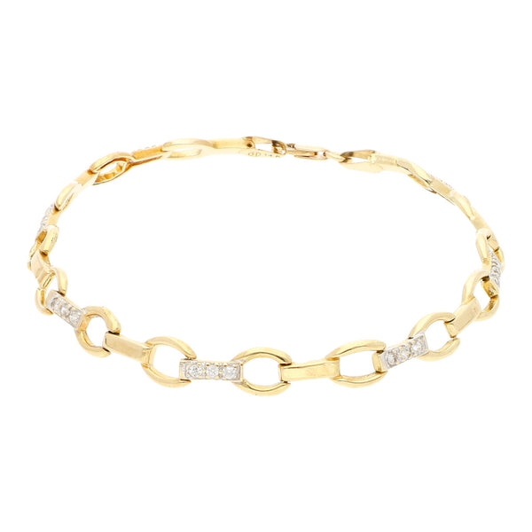 Pulsera eslabón articulado con circonias en oro amarillo 14 kilates.
