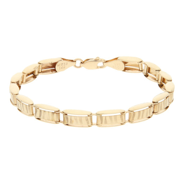 Pulsera eslabón articulado en oro amarillo 14 kilates.