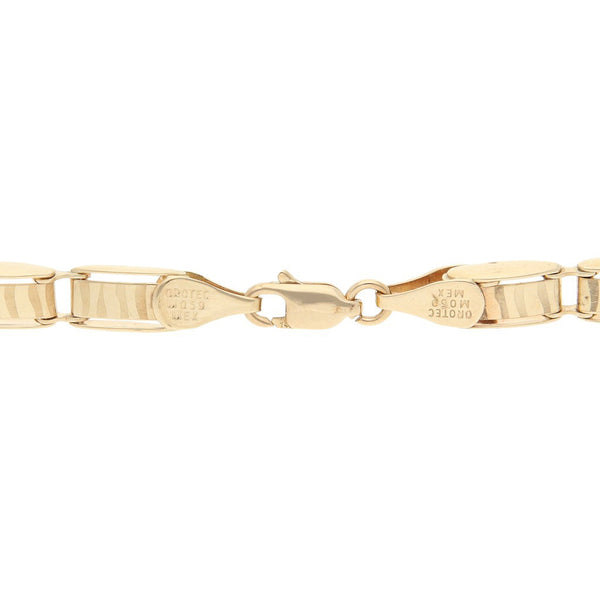 Pulsera eslabón articulado en oro amarillo 14 kilates.