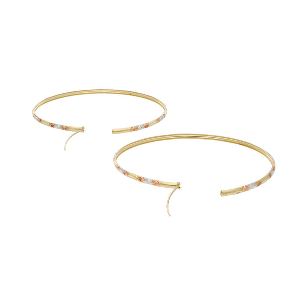 Arracadas labradas en oro amarillo 14 kilates.