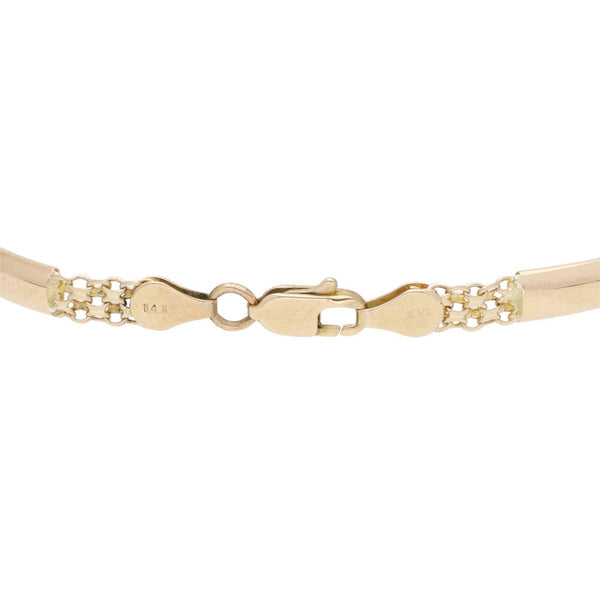 Pulsera eslabón articulado en oro amarillo 14 kilates.