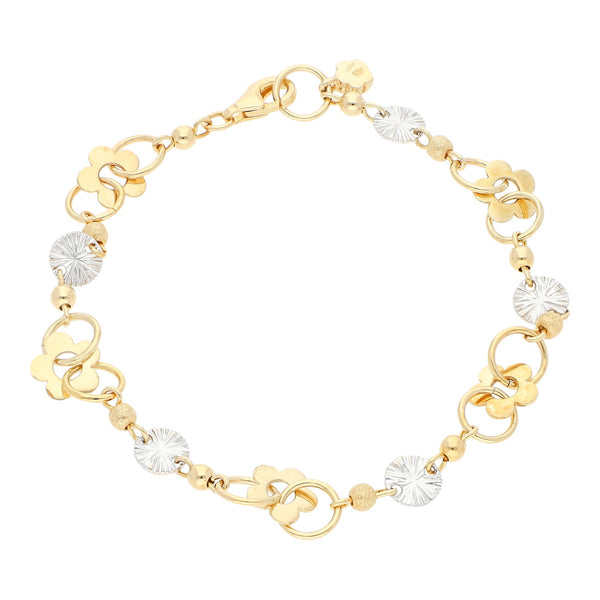 Pulsera eslabón combinado con aplicaciones de flor en oro dos tonos 14 kilates.