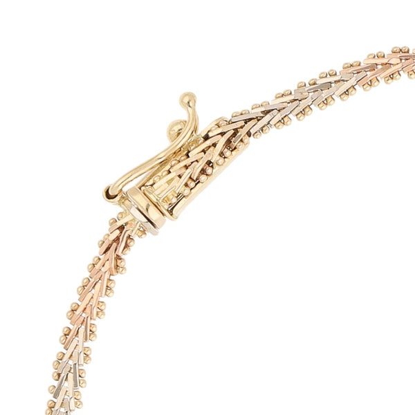 Pulsera eslabón boleado en oro tres tonos 14 kilates.