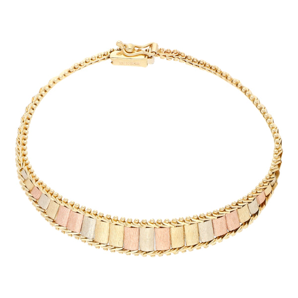 Pulsera eslabón boleado en oro tres tonos 14 kilates.