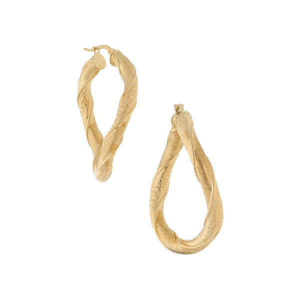 Arracadas huecas en oro amarillo 14 kilates.