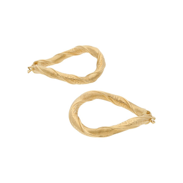 Arracadas huecas en oro amarillo 14 kilates.