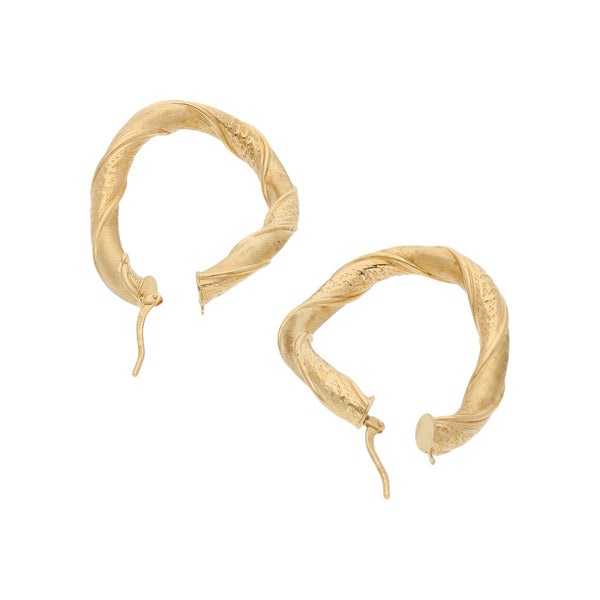 Arracadas huecas en oro amarillo 14 kilates.