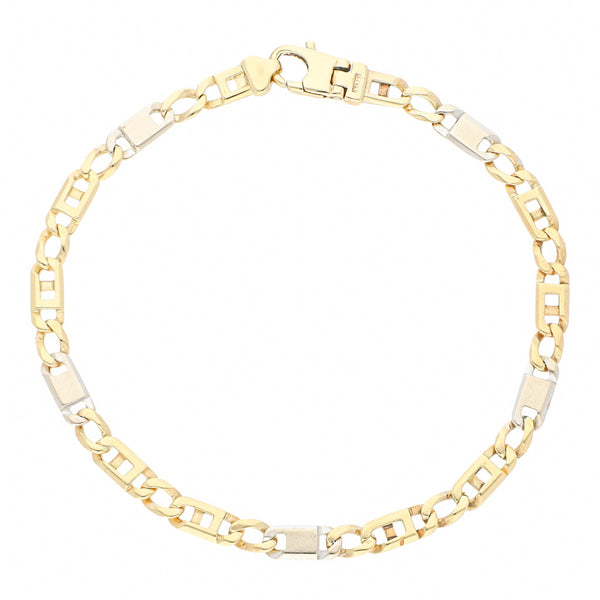 Pulsera eslabón combinado en oro dos tonos 14 kilates.