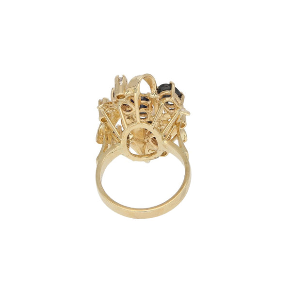 Anillo diseño especial con zafiros y circonias en oro amarillo 14 kilates.