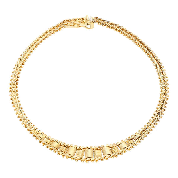 Pulsera eslabón boleado en oro amarillo 14 kilates.