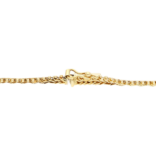 Pulsera eslabón boleado en oro amarillo 14 kilates.