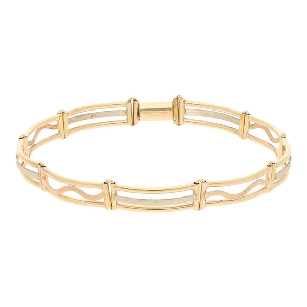 Pulsera eslabón articulado en oro tres tonos 12 kilates.