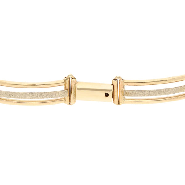 Pulsera eslabón articulado en oro tres tonos 12 kilates.