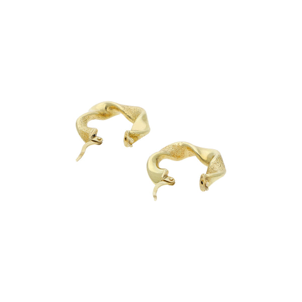 Arracadas y broqueles diseño especial con circonias en oro dos tonos 14 kilates.