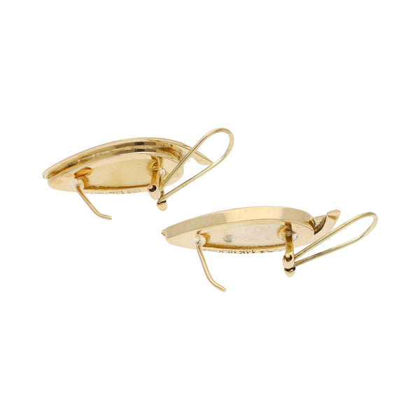 Juego anillo y aretes diseño especial con marfil en oro amarillo 14 kilates.