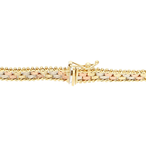 Pulsera eslabón boleado en oro tres tonos 14 kilates.