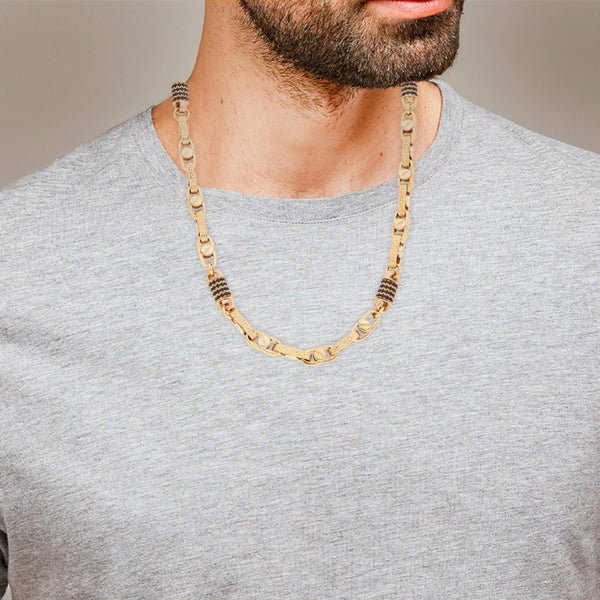 Collar eslabón cruzado con sintéticos en oro dos tonos 14 kilates.