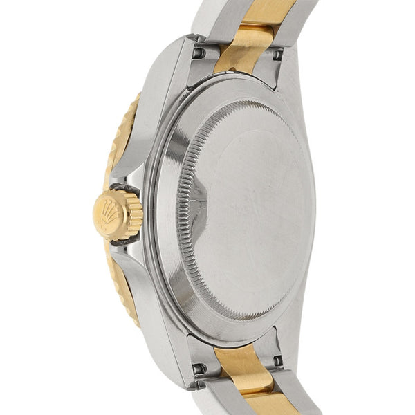 Reloj Rolex para caballero modelo Oyster Perpetual Date Submariner vistas en oro amarillo 18 kilates.